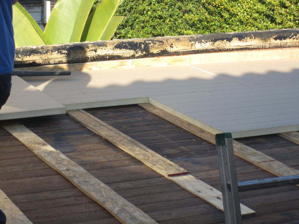 Tapered insulation for flat roofs